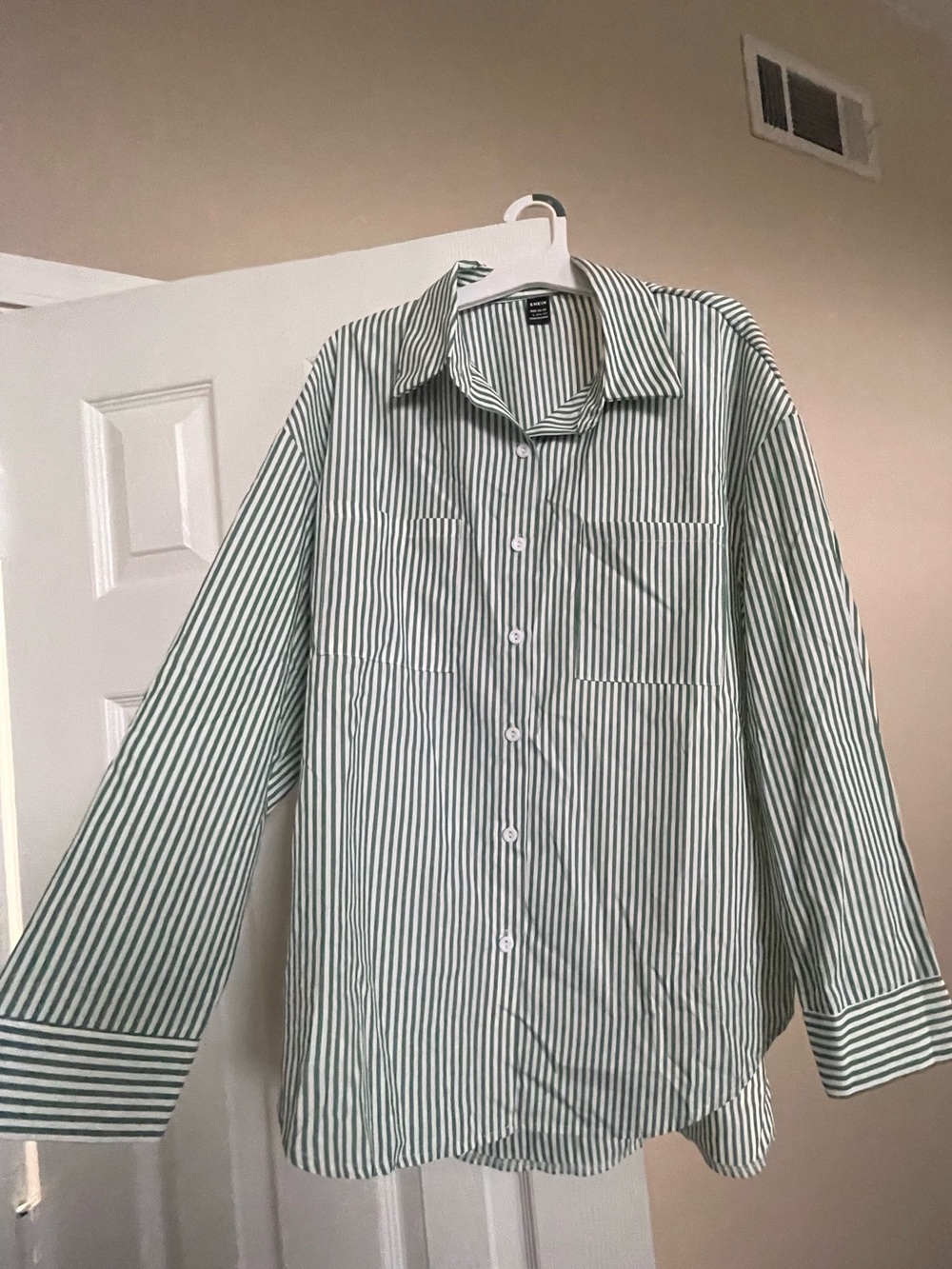 Woman’s Green Striped Button-Up Shirt
